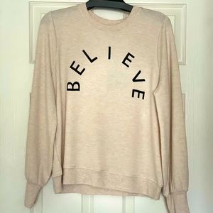 B E L I E V E - top new and never worn